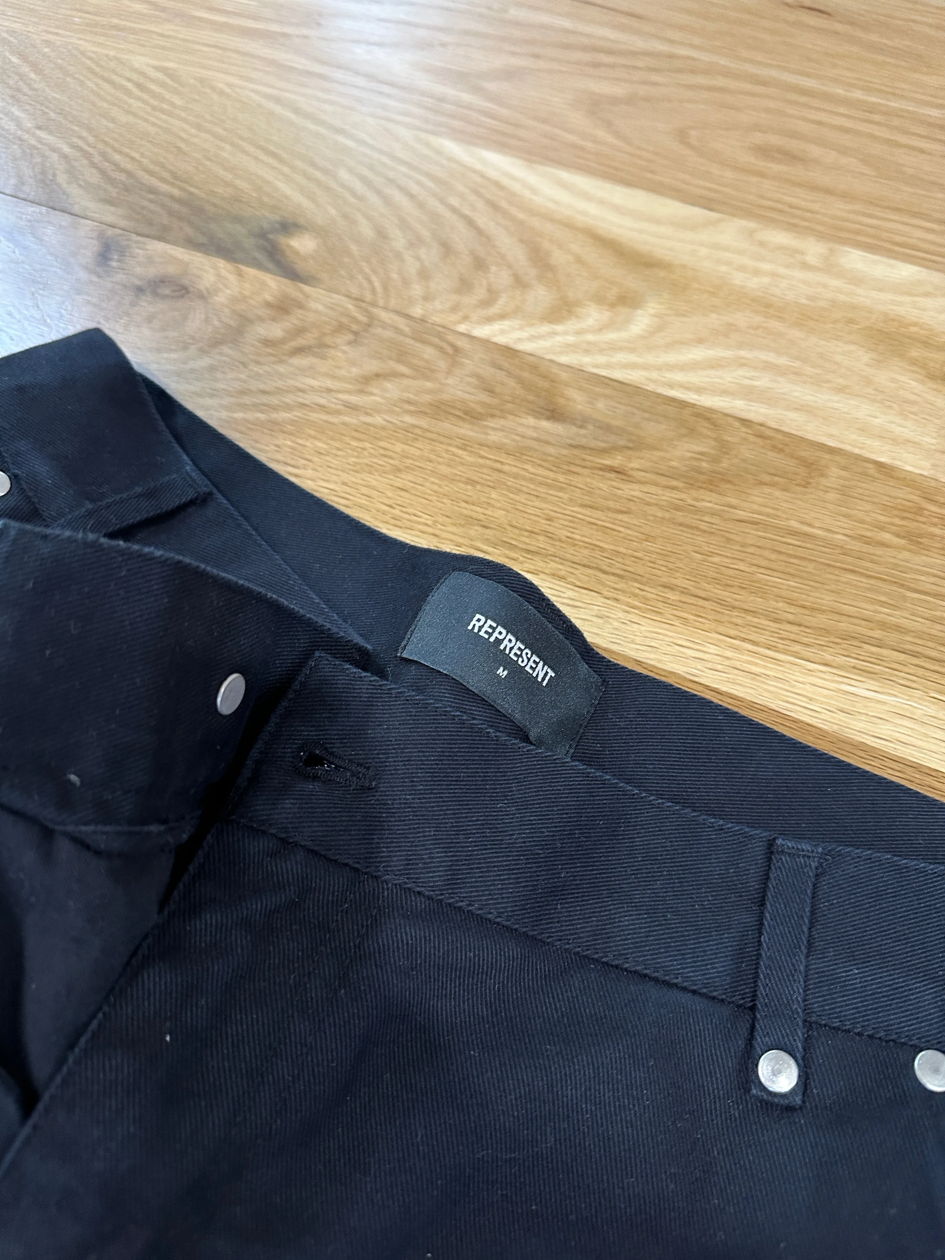 Represent EMBOSSED UTILITY PANTS Sz M